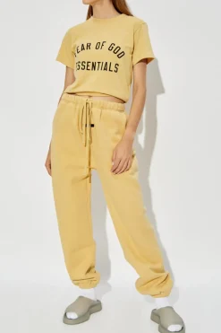 Fear Of God Essentials ŻÓŁTY Spodnie dresowe z logo
