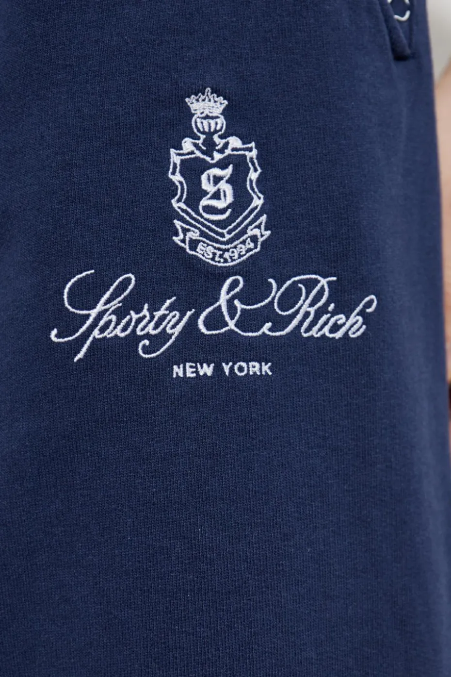 Sporty & Rich GRANATOWY Spodnie dresowe z kolekcji `Preppy`